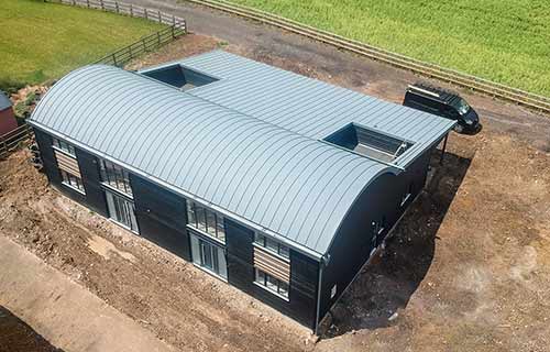 P and F Cladding - grain barn - lean-to roof