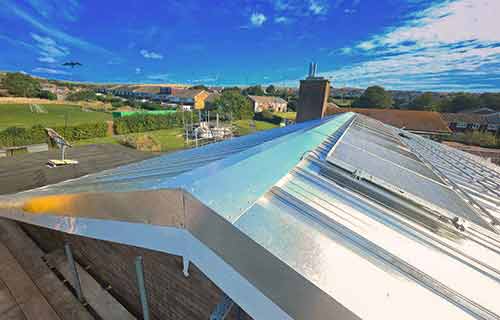 P and F Cladding - Wickham: corrugated Tata System and flashings