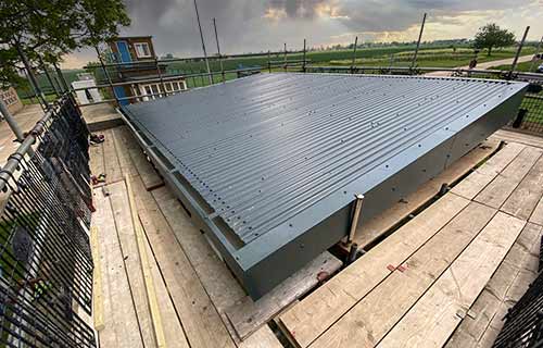 P and F Cladding - Shoeburyness: corrugated aluminium roof