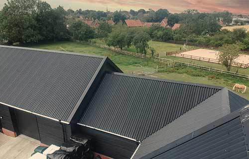 P and F Cladding - Wickham: corrugated Tata System and flashings