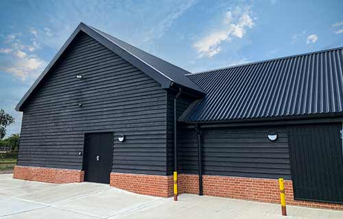 P and F Cladding - Wickham: corrugated Tata System and flashings