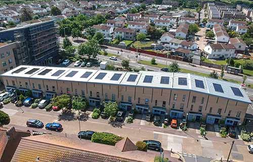 P and F Cladding - Rainham Rd South - insulation with bespoke aluminium gutters and fascia