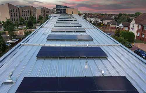 P and F Cladding - Rainham Rd South - insulation with bespoke aluminium gutters and fascia